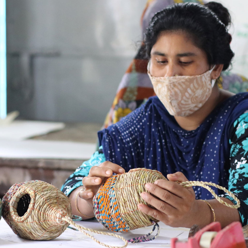 Lady checking quality of the artisan nesters